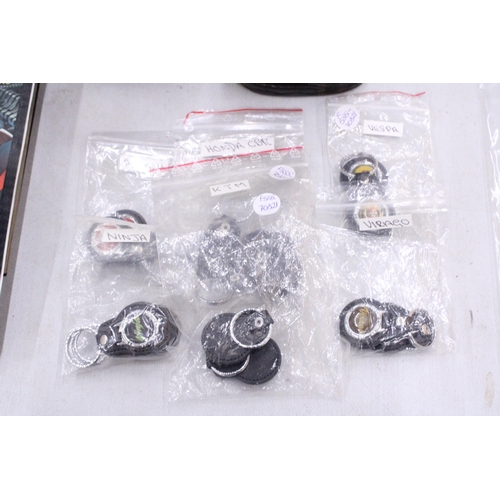 286 - A QUANTITY OF MOTORCYCLE KEYRINGS TO INCLUDE HONDA CBR, VIRAGO, KTM, ETC.,