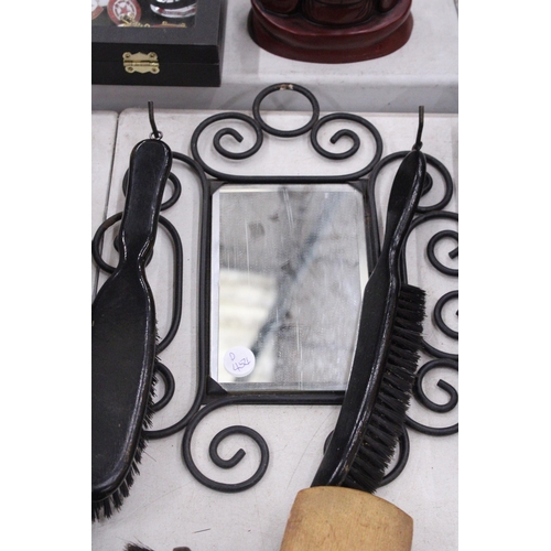 294 - A VINTAGE WROUGHT IRON FRAMED MIRROR WITH SHOE SHINE GROOMING BRUSHES TOGETHER WITH FURTHER BRUSHES,... 