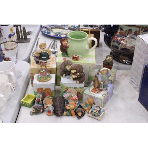 296 - A QUANTITY OF HEDGEHOG FIGURES AND A BOXED MUG