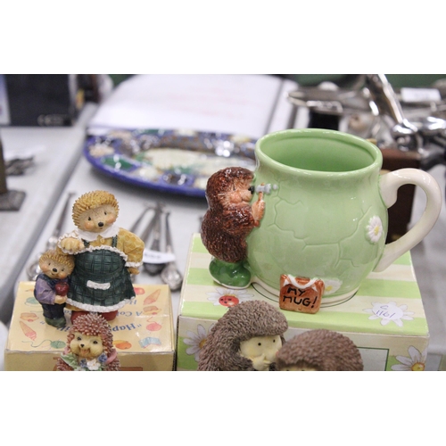 296 - A QUANTITY OF HEDGEHOG FIGURES AND A BOXED MUG