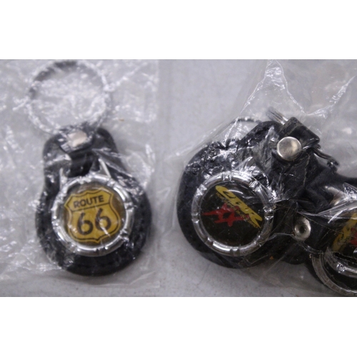 300 - A QUANTITY OF MOTORCYCLE KEY RINGS TO INCLUDE BMW RT, ROUTE 66, YAMAHA RI, ETC.,