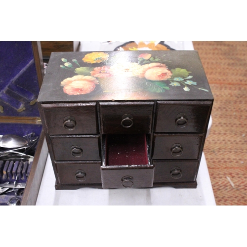 313 - A VINTAGE NINE DRAWER WOODEN JEWELLERY BOX WITH PAINTED FLORAL DESIGN