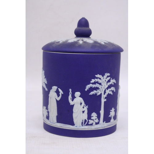 318 - A WEDGWOOD DARK BLUE DIPPED JASPERWARE ACORN FINIAL BISCUIT BARREL