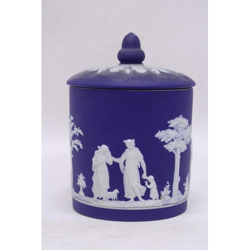 318 - A WEDGWOOD DARK BLUE DIPPED JASPERWARE ACORN FINIAL BISCUIT BARREL