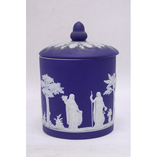 318 - A WEDGWOOD DARK BLUE DIPPED JASPERWARE ACORN FINIAL BISCUIT BARREL