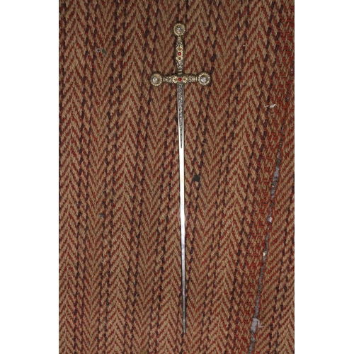 329 - AN ORNAMENTAL CHROMED STEEL SWORD WITH JEWELLED HANDLE