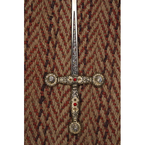 329 - AN ORNAMENTAL CHROMED STEEL SWORD WITH JEWELLED HANDLE