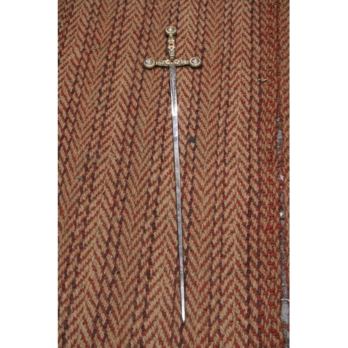 329 - AN ORNAMENTAL CHROMED STEEL SWORD WITH JEWELLED HANDLE