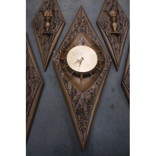 336 - A VINTAGE STYLE WALL CLOCK AND FOUR PLAQUES, IN DIAMOND SHAPED FRAMES WITH CHESS STYLE DECORATION