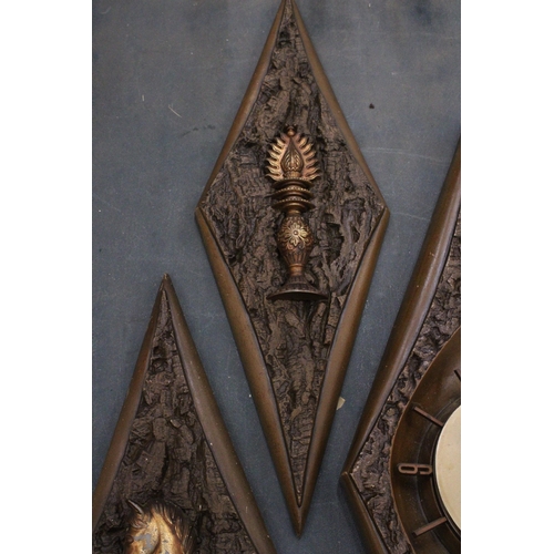 336 - A VINTAGE STYLE WALL CLOCK AND FOUR PLAQUES, IN DIAMOND SHAPED FRAMES WITH CHESS STYLE DECORATION