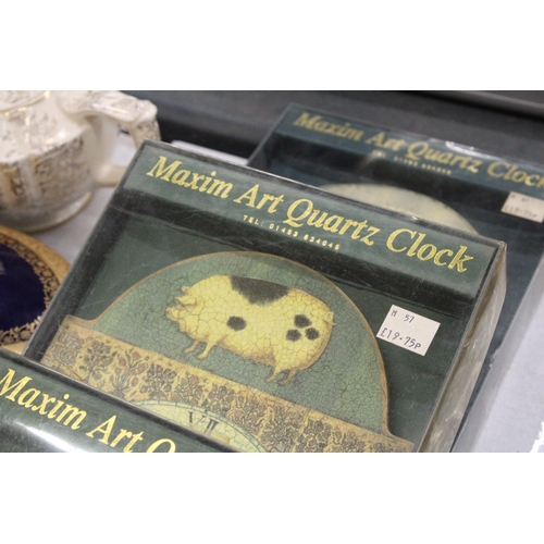 343 - FOUR BOXED MAXIM ART QUARTZ CLOCKS - JUDY GABRIEL DESIGN