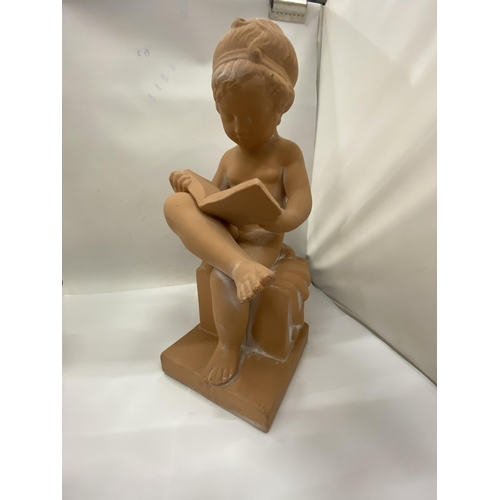 40 - A CHALKWARE  FIGURE OF A SEATED BOY READING A BOOK TOGETHER WITH A BUST OF AN ELEGANT LADY