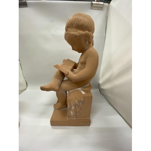 40 - A CHALKWARE  FIGURE OF A SEATED BOY READING A BOOK TOGETHER WITH A BUST OF AN ELEGANT LADY