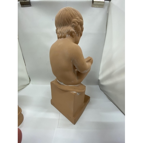 40 - A CHALKWARE  FIGURE OF A SEATED BOY READING A BOOK TOGETHER WITH A BUST OF AN ELEGANT LADY