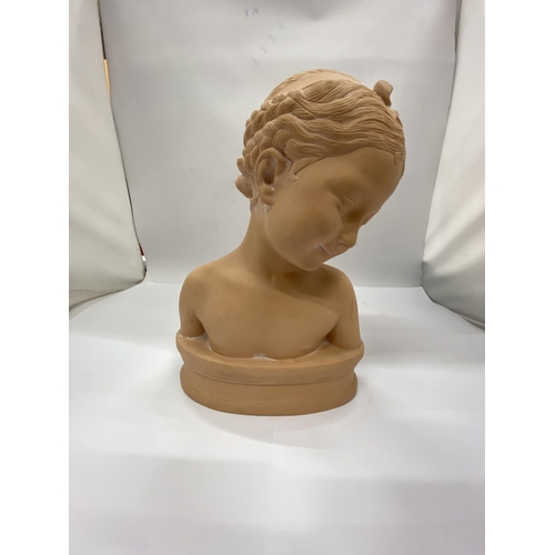 40 - A CHALKWARE  FIGURE OF A SEATED BOY READING A BOOK TOGETHER WITH A BUST OF AN ELEGANT LADY