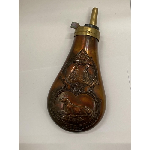 42 - A BRASS AND COPPER POWDER FLASK