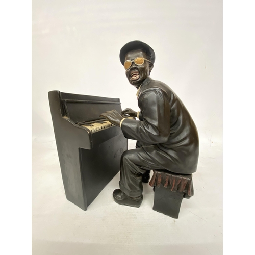 46 - A JAZZ PIANO PLAYER FIGURINE