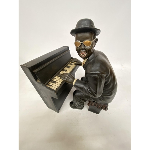 46 - A JAZZ PIANO PLAYER FIGURINE