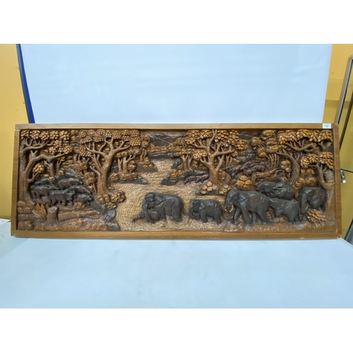 50 - A CARVED BALINESE WOODEN PANEL WITH THREE DIMENSIONAL WORK OF ART - APPROX 142 X 49 CM