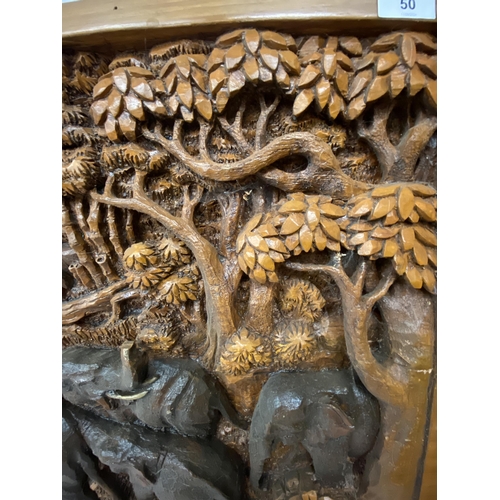 50 - A CARVED BALINESE WOODEN PANEL WITH THREE DIMENSIONAL WORK OF ART - APPROX 142 X 49 CM