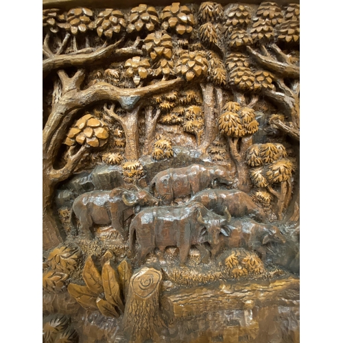 50 - A CARVED BALINESE WOODEN PANEL WITH THREE DIMENSIONAL WORK OF ART - APPROX 142 X 49 CM