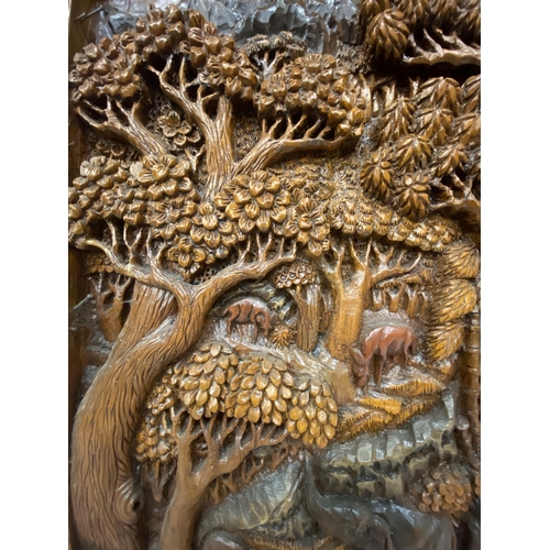 51 - TWO CARVED BALINESE WOODEN PANELS WITH THREE DIMENSIONAL WORK OF ART - APPROX 70 X 49.5 CM