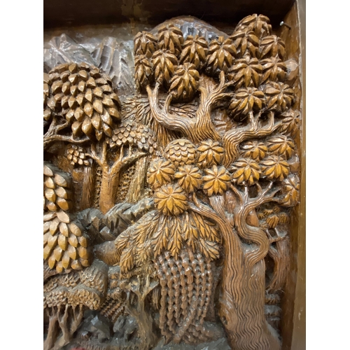 51 - TWO CARVED BALINESE WOODEN PANELS WITH THREE DIMENSIONAL WORK OF ART - APPROX 70 X 49.5 CM