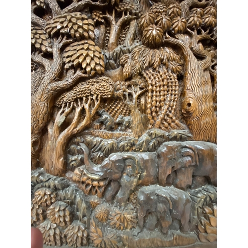 51 - TWO CARVED BALINESE WOODEN PANELS WITH THREE DIMENSIONAL WORK OF ART - APPROX 70 X 49.5 CM