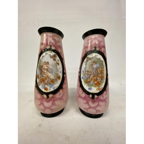 55 - A PAIR OF FRENCH STYLE PINK OPALINE HAND PAINTED VASES WITH TRANSFERS OF FAIR MAIDENS - 33 CM