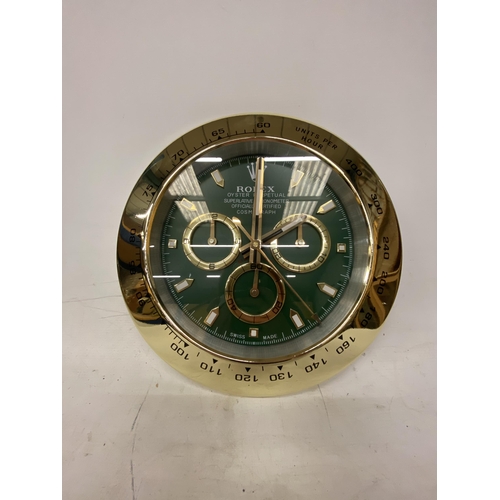 69 - A DEALERS WALL CLOCK