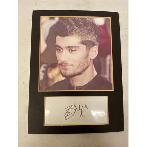 75 - TWO SIGNED AUTOGRAPHS OF ZAYN MALIK FROM THE BAND ONE DIRECTION - WHIST WE BELIEVE THE SIGNATURE/S T... 