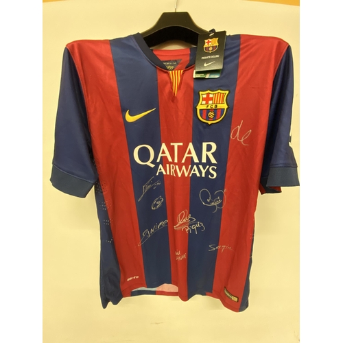 77 - A BARCELONA TEAM SIGNED SHIRT - SIGNATURES BELIEVED TO INCLUDE LIONEL MESSI