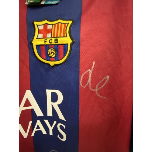 77 - A BARCELONA TEAM SIGNED SHIRT - SIGNATURES BELIEVED TO INCLUDE LIONEL MESSI