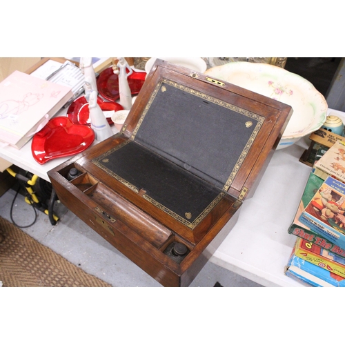 999 - A MAHOGANY WRITING SLOPE WITH INKWELLS