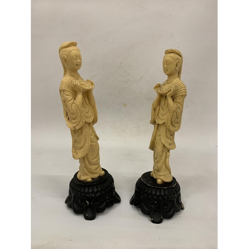 108 - TWO RESIN ORIENTAL FIGURES - 23 CM