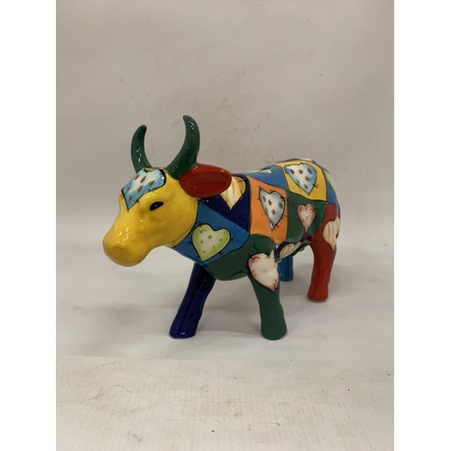 110 - A HANDPAINTED CERAMIC MONEY BOX COW