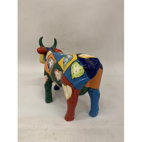 110 - A HANDPAINTED CERAMIC MONEY BOX COW