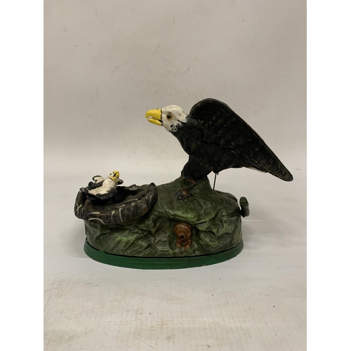 116 - A CAST IRON EAGLE AND EAGLET MECHANICAL COIN BANK