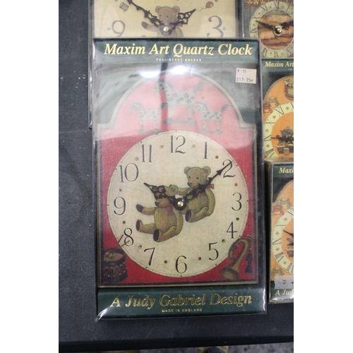 174 - EIGHT BOXED MAXIM ART QUARTZ CLOCKS - JUDY GABRIEL DESIGN