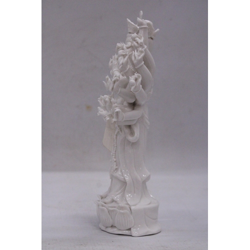 177 - A PORCELAIN GUAN YIN STATUE