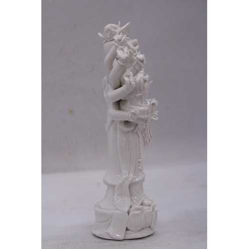 177 - A PORCELAIN GUAN YIN STATUE