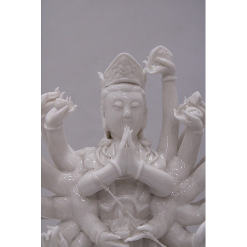 177 - A PORCELAIN GUAN YIN STATUE