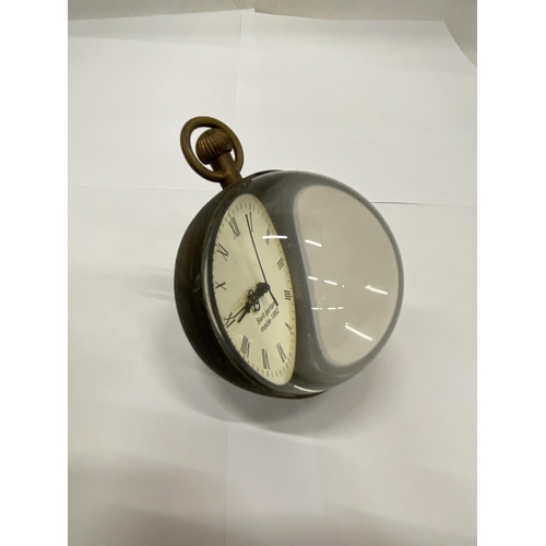 19 - A BRASS AND GLASS BUBBLE CLOCK