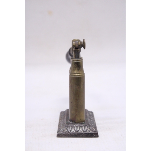 205 - AN UNUSUAL VINTAGE BRASS BULLET CAP SEALER