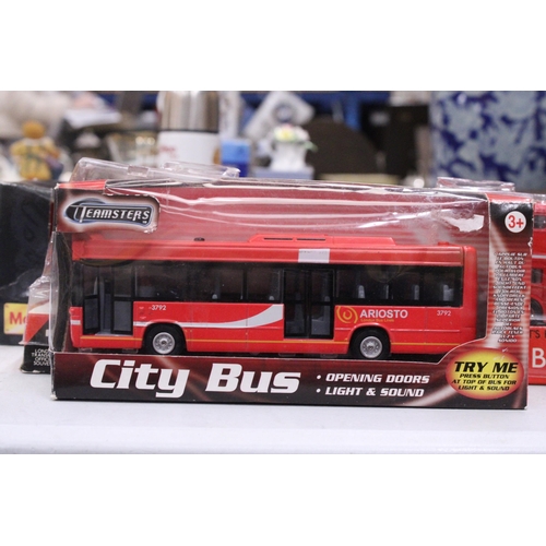 208 - THREE DIECAST BUSES AND A MAISTO VAN, TRAILER AND SPORTS CAR