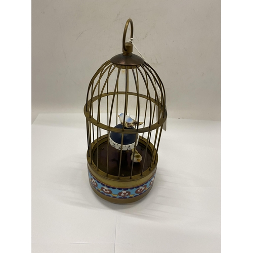 21 - A MECHANICAL BRASS BIRD CLOCK