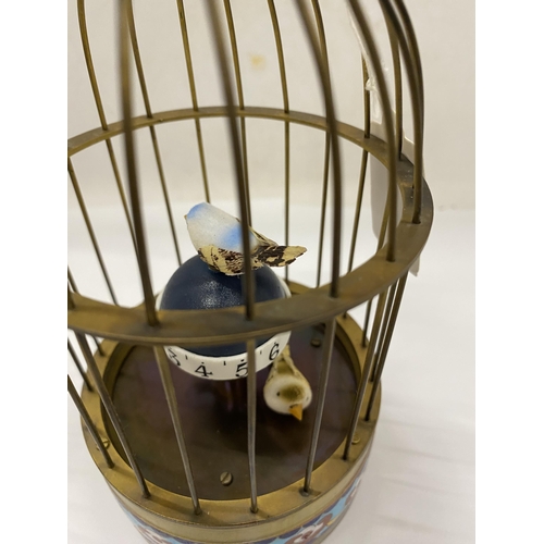 21 - A MECHANICAL BRASS BIRD CLOCK