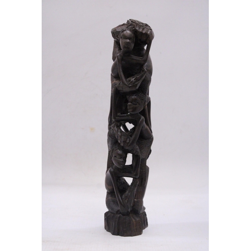 241 - AN AFRICAN HAND CARVED TREE OF LIFE FIGURE, HEIGHT 29CM