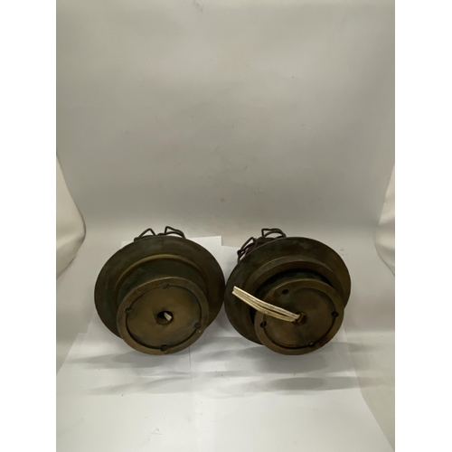 37 - A PAIR OF COASTAL NAUTICAL MARINE LIGHTS IN A BRASS CAGE