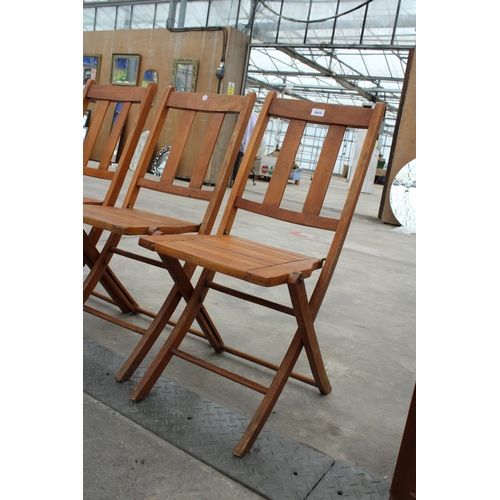 2810 - THREE MID 20TH CENTURY FOLDING PATIO CHAIRS